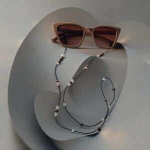 akiniu grandinele rodonitas